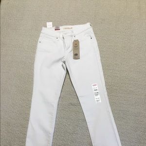 Levi mid rise skinny jeans
